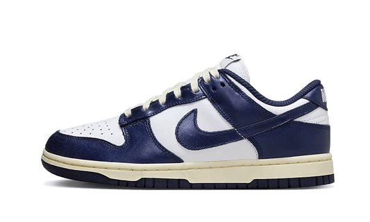 dunk-low-vintage-navy-basketsold